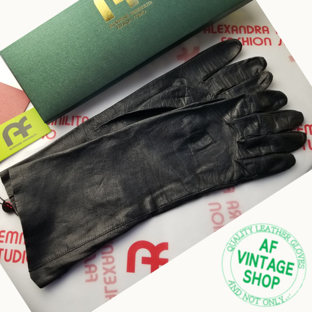SPECIFICALLY THIS PAIR OF MID-LENGTH VINTAGE BLACK LEATHER GLOVES