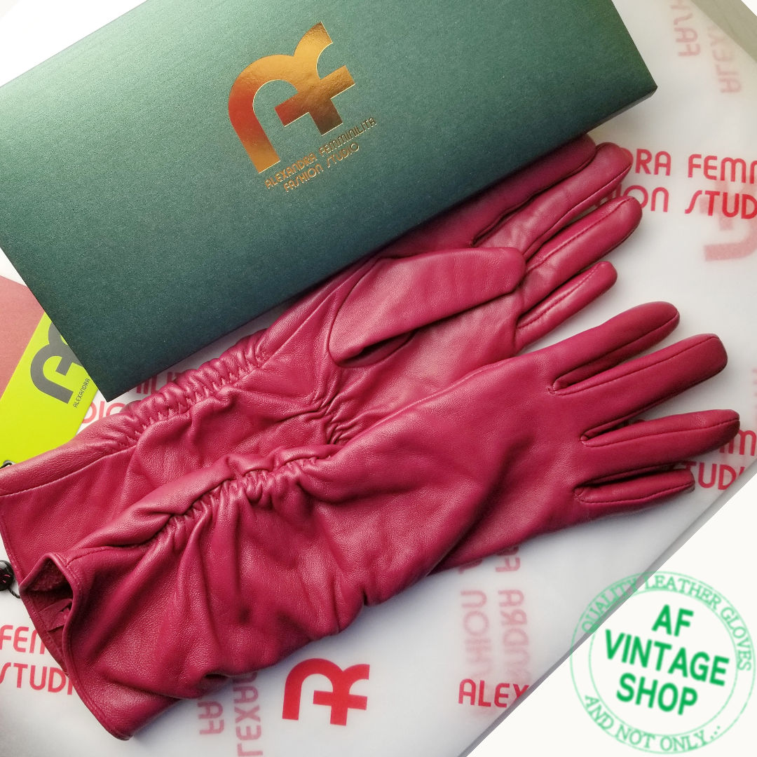 SPECIFICALLY THIS PAIR OF MID-LENGTH RASPBERRY RED LEATHER GLOVES