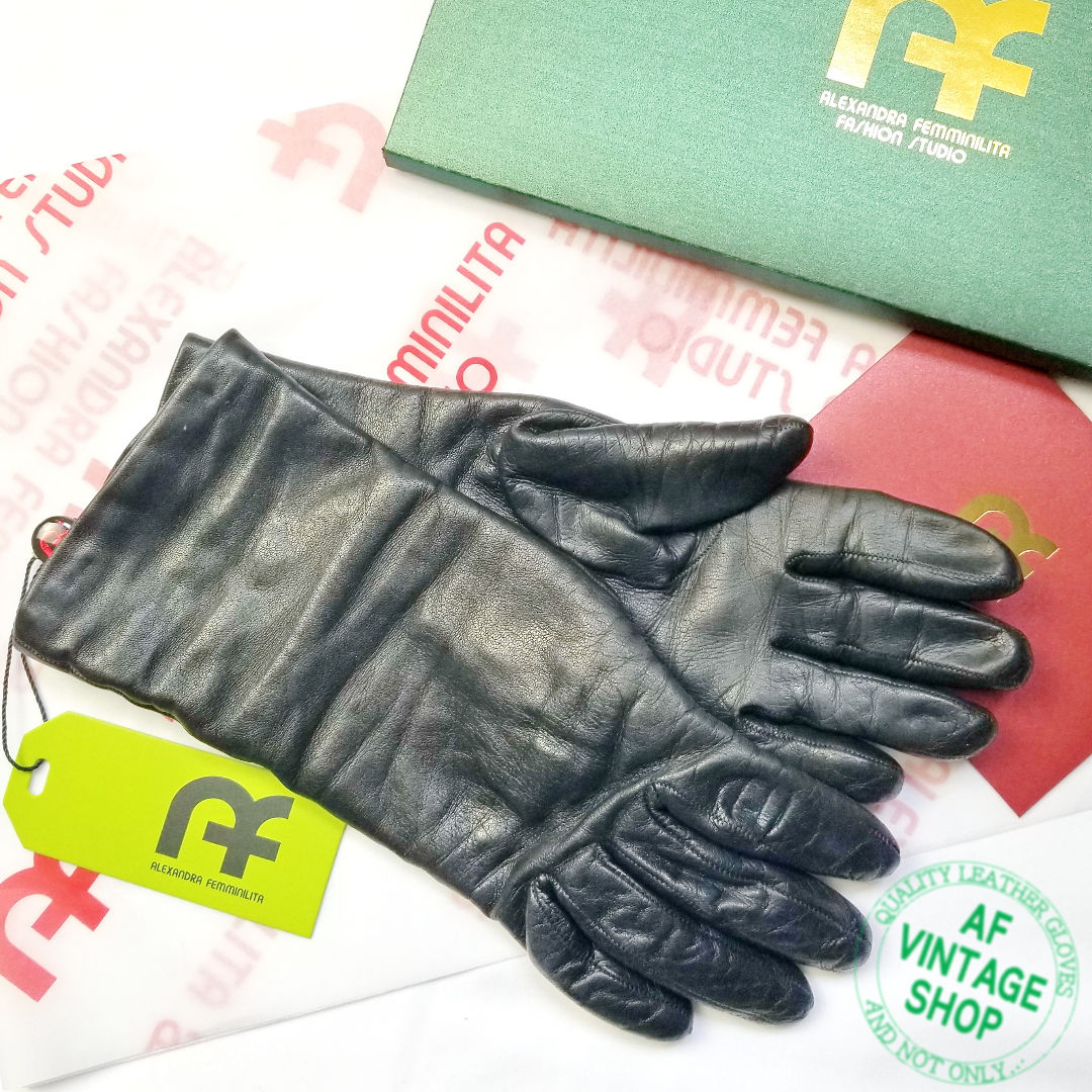 SPECIFICALLY THIS PAIR OF STRICT BLACK WOOL-LINED LEATHER GLOVES