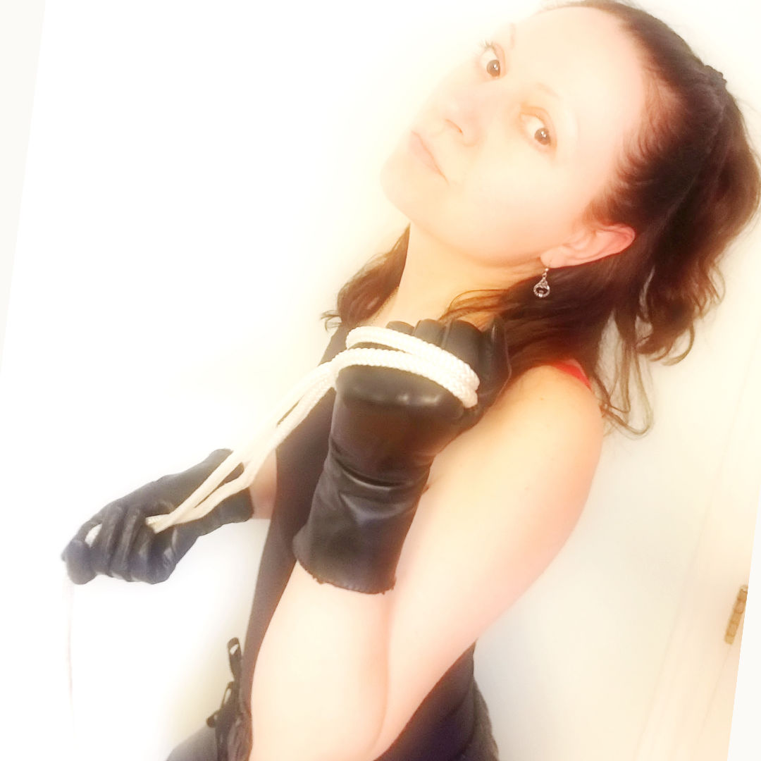 SPECIFICALLY THIS PAIR OF SHORT VERY SPECIAL STRICT BLACK LEATHER GLOVES