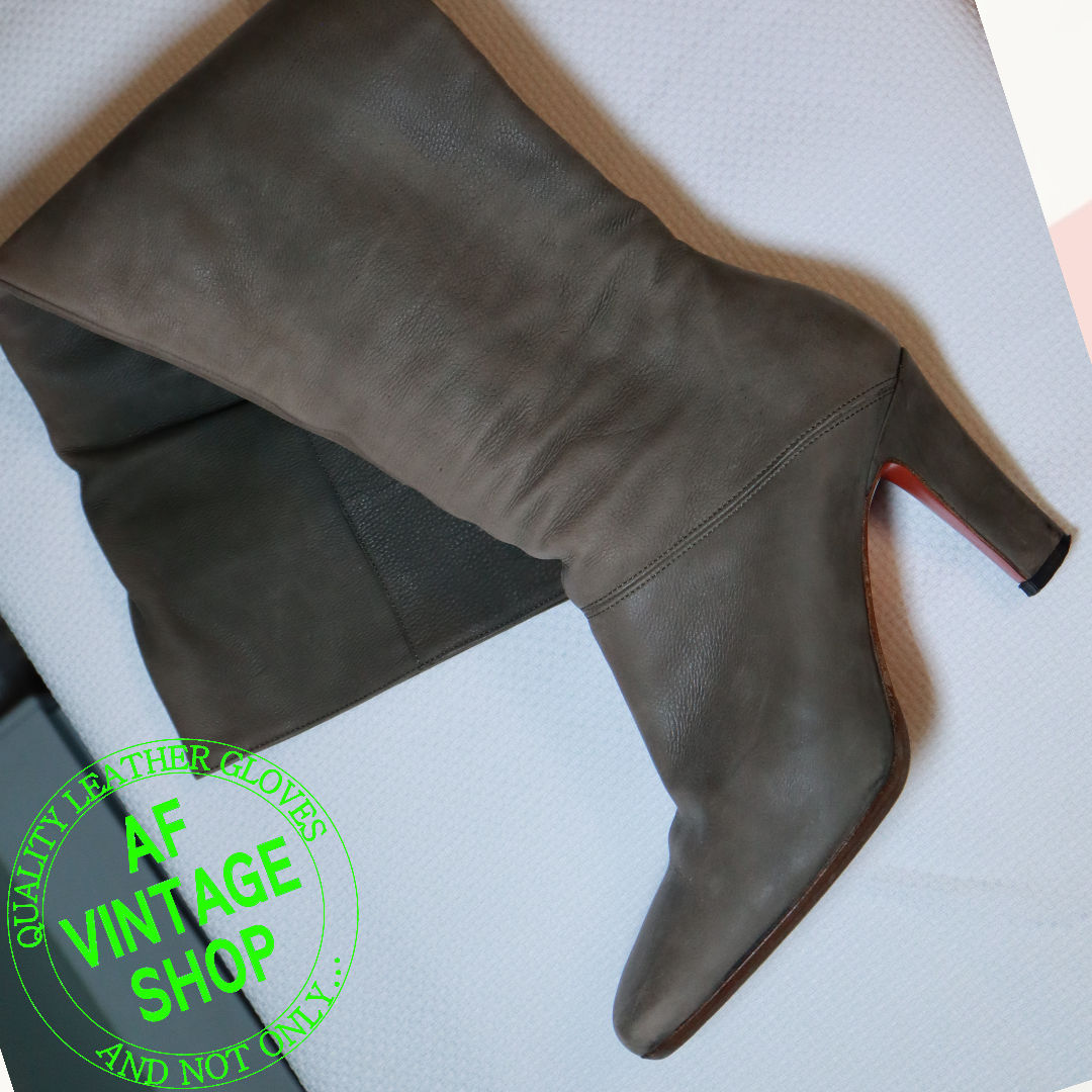 SPECIFICALLY THIS PAIR OF OVER-THE-KNEE OLIVE GREEN LEATHER BOOTS