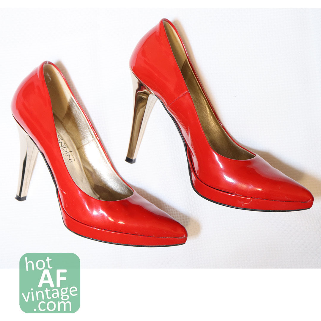 SPECIFICALLY THIS PAIR OF DARING RED PATENT LEATHER SHOES
